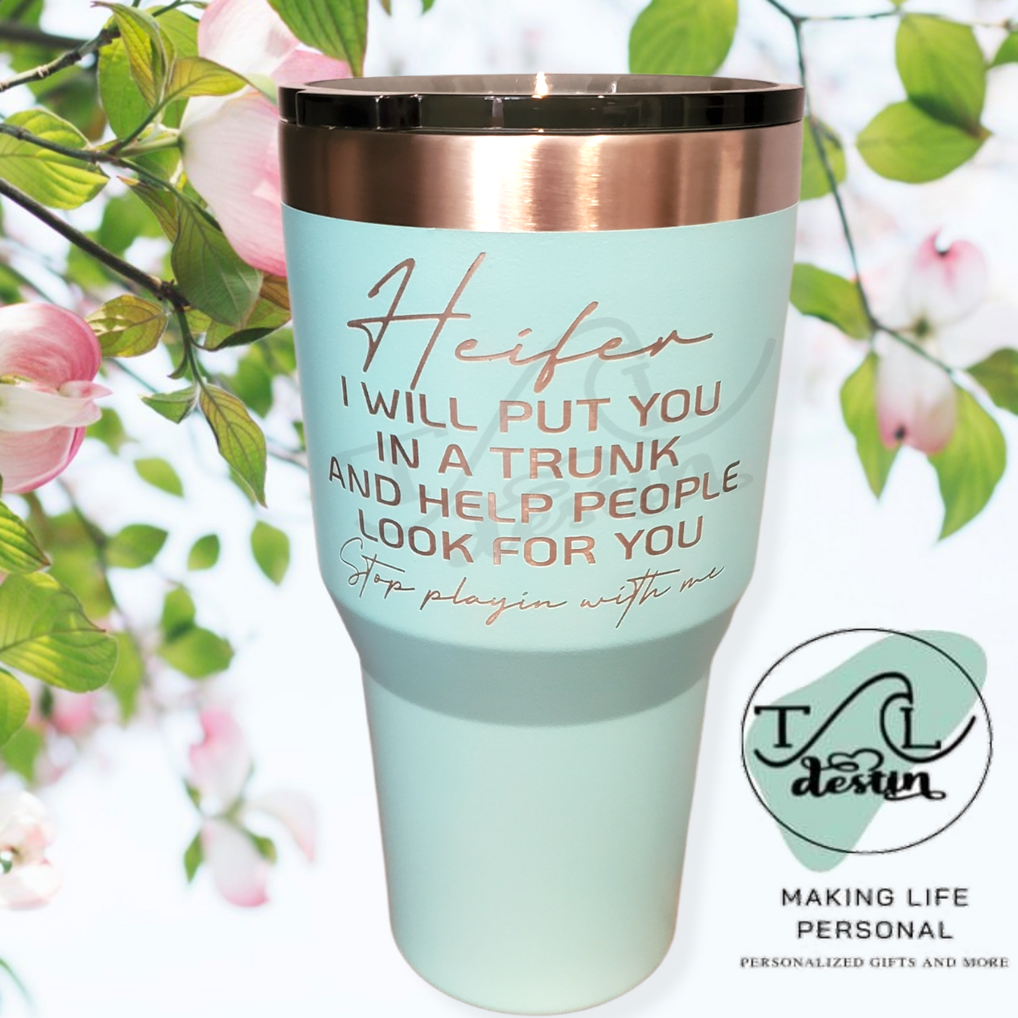 32 oz sea blue Tumbler. Laser engraved with quote "Heifer I will put you in a trunk and help people look for you" Snarky quote tumblers. Ozark brand with standard lid