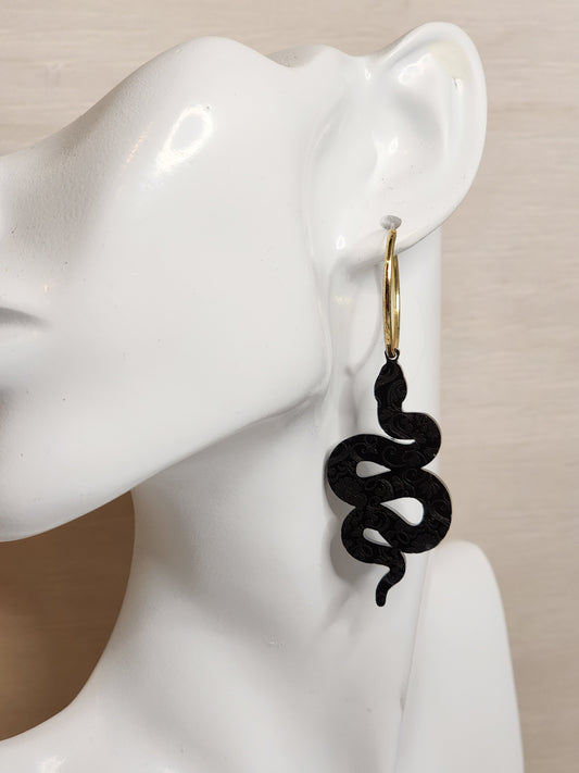 Black floral snake earrings