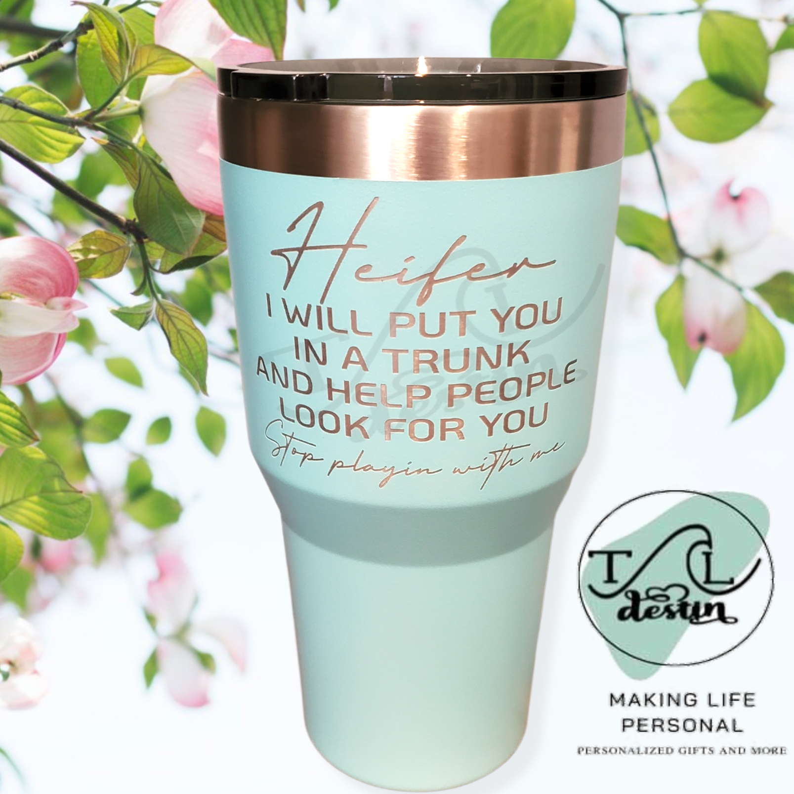 32 oz sea blue Tumbler. Laser engraved with quote "Heifer I will put you in a trunk and help people look for you" Snarky quote tumblers. Ozark brand with standard lid